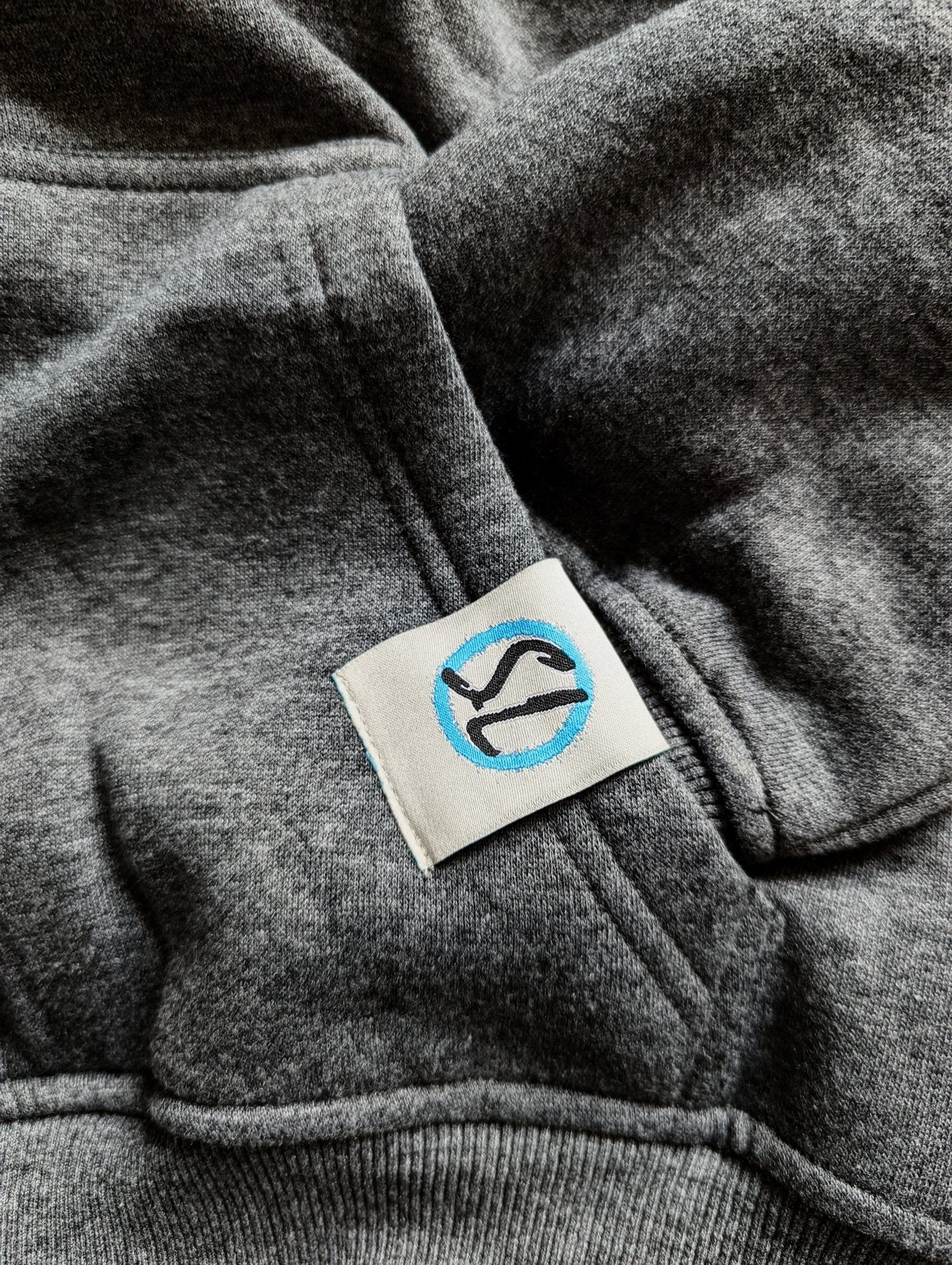 Our signature logo on our sweatshirt. We take pride in crafting long lasting quality clothing, and want to show off a little.