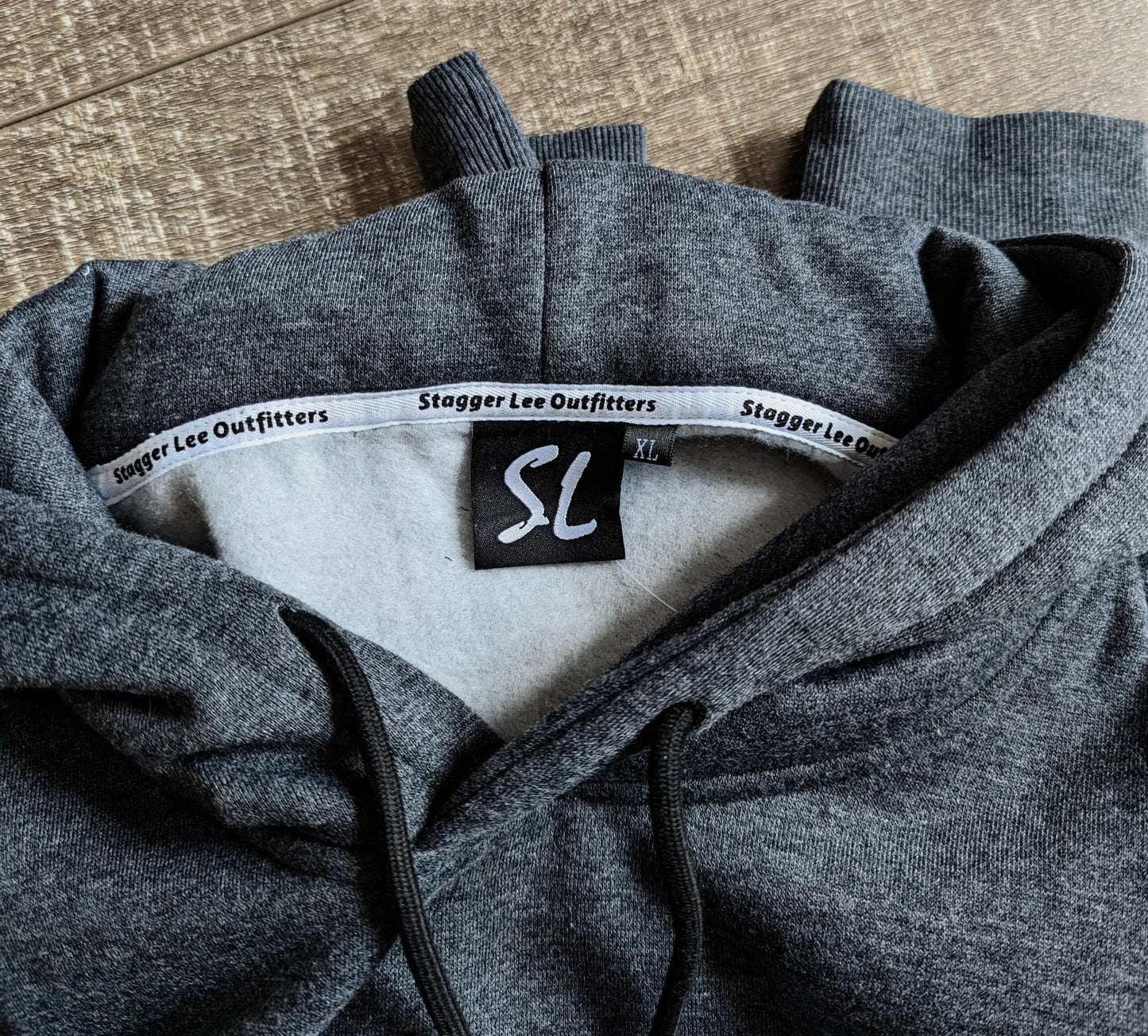 Low Profile Minnesota Emblem In Black | Stagger Lee's Charcoal Fleece Hoodie - Stagger Lee Outfitters